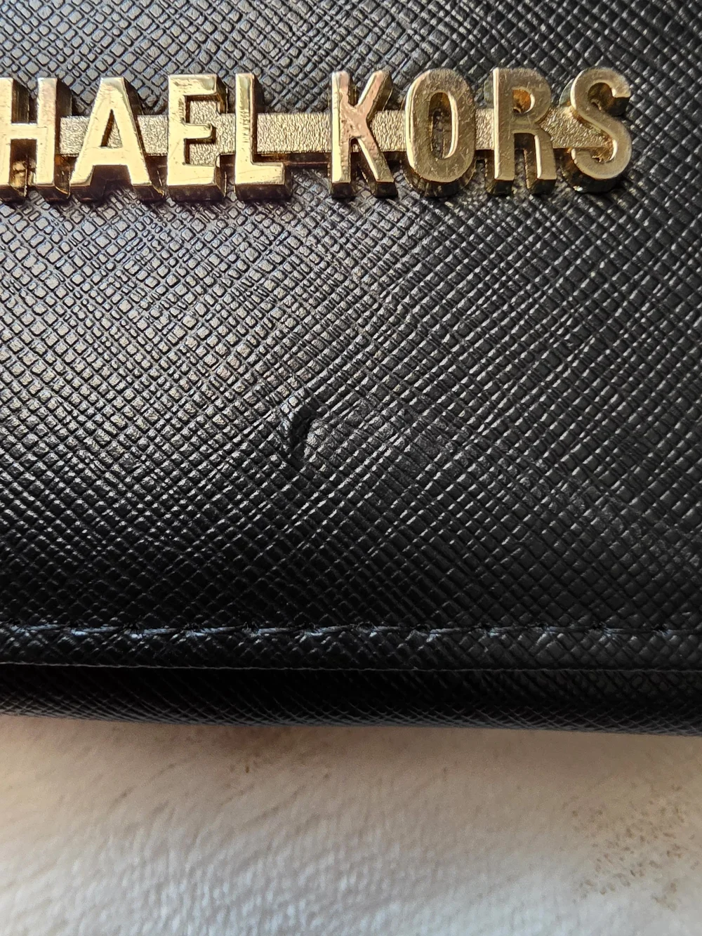 Black Wallet with Gold Logo